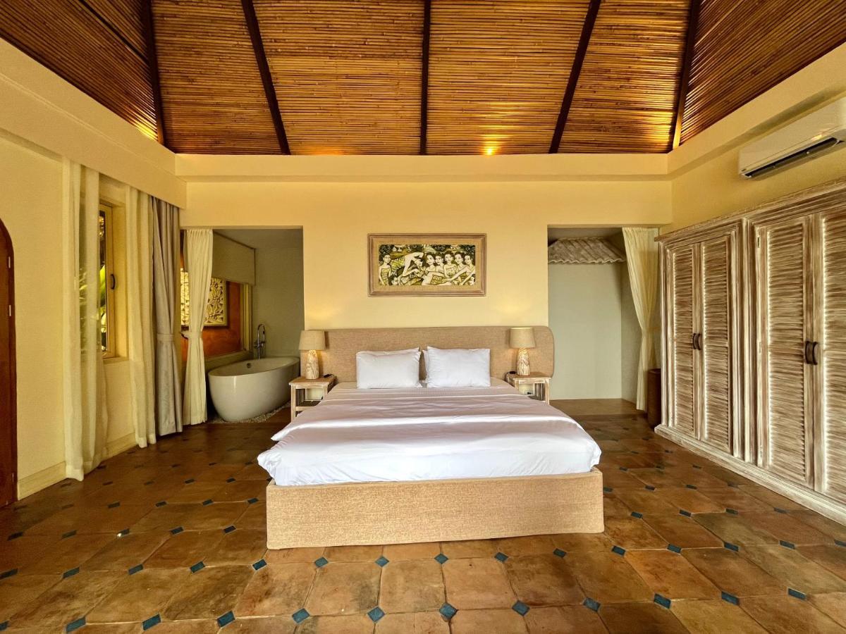 Coco Grove Beach Resort, Siquijor Island ภายนอก รูปภาพ A bedroom at the resort