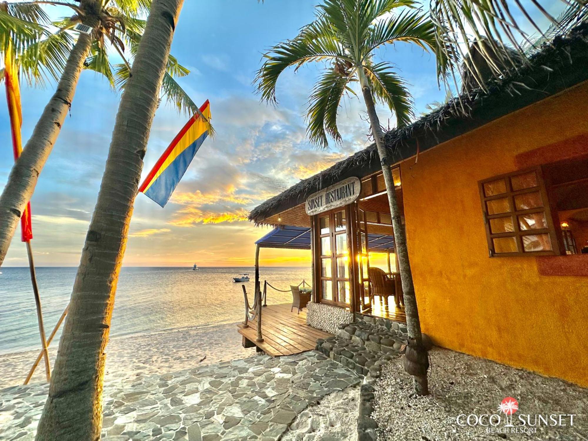 Coco Grove Beach Resort, Siquijor Island ภายนอก รูปภาพ Sunset at the beach